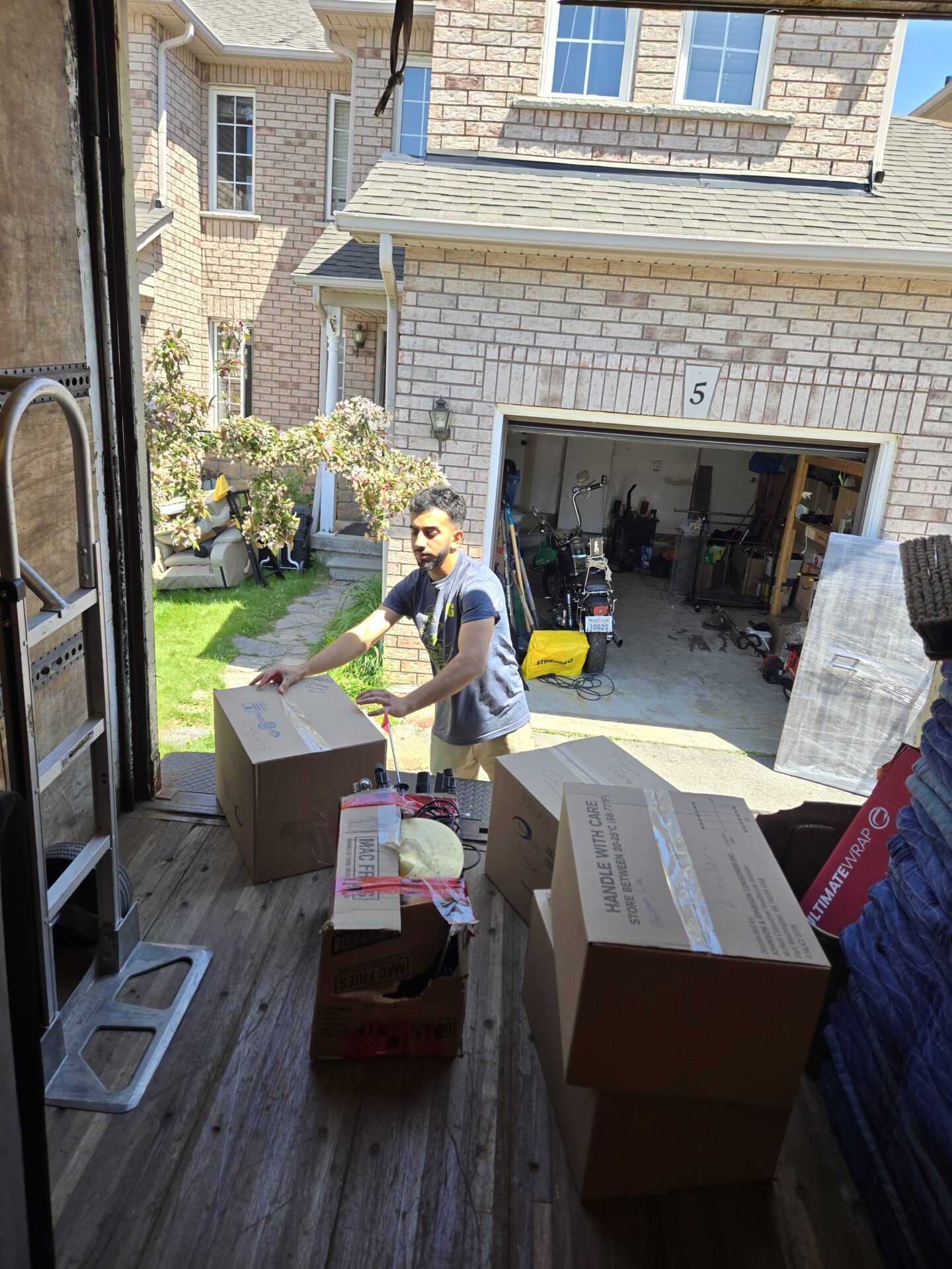 Enfield move completed — crew loading house