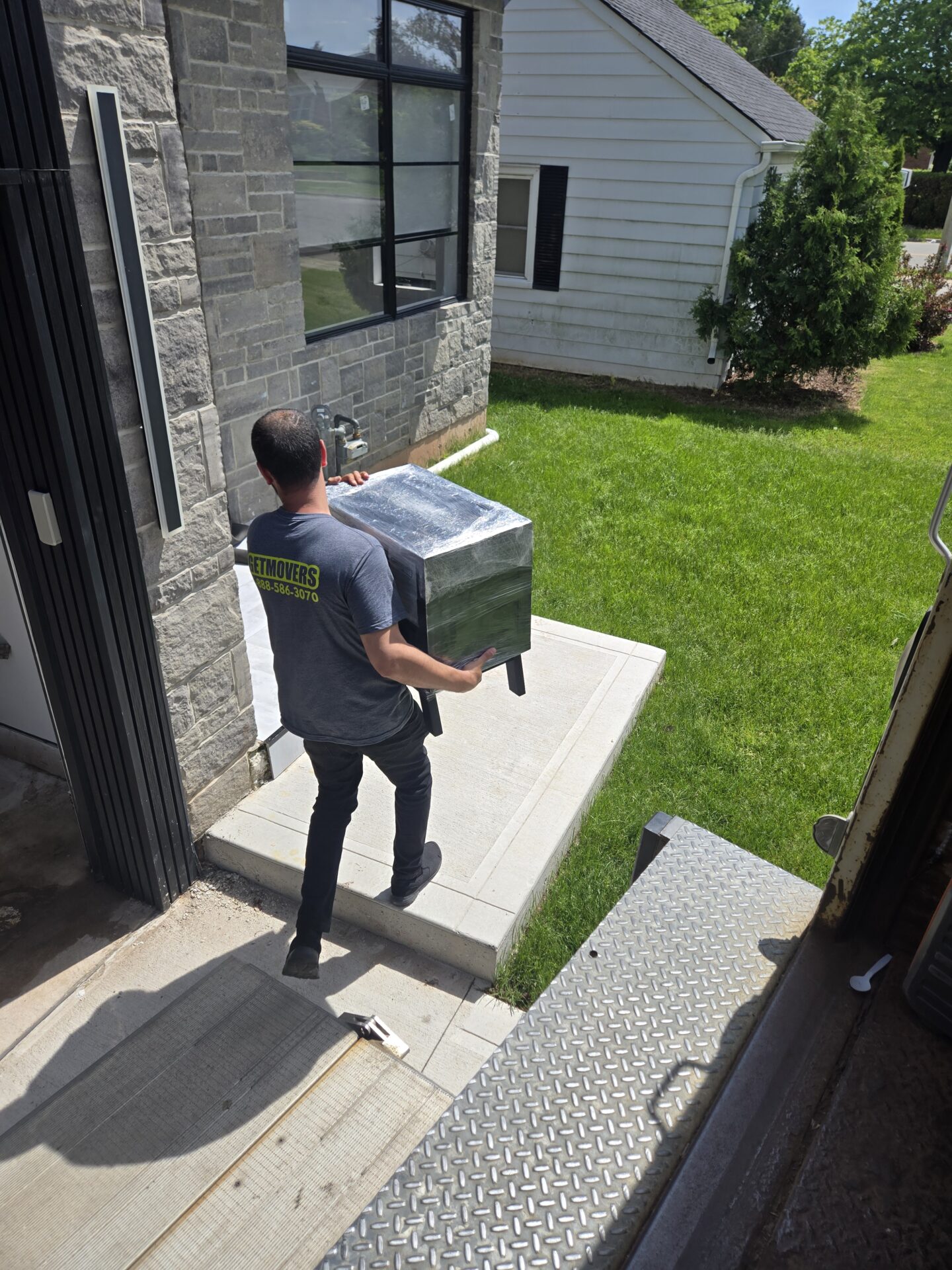 Moving from Renfrew Road — truck on rural driveway