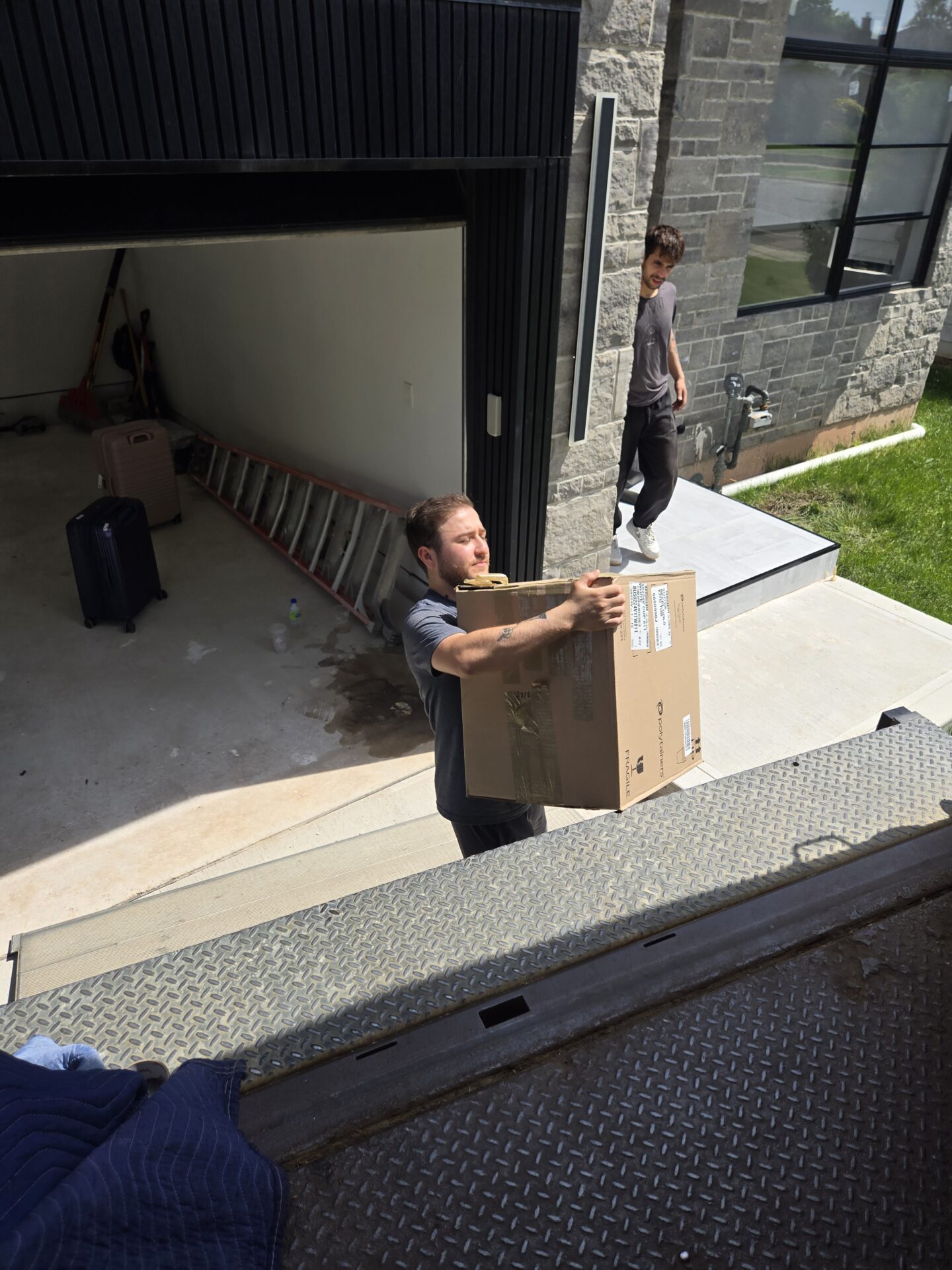 Moving from Oakfield Park Rd — truck on suburban road