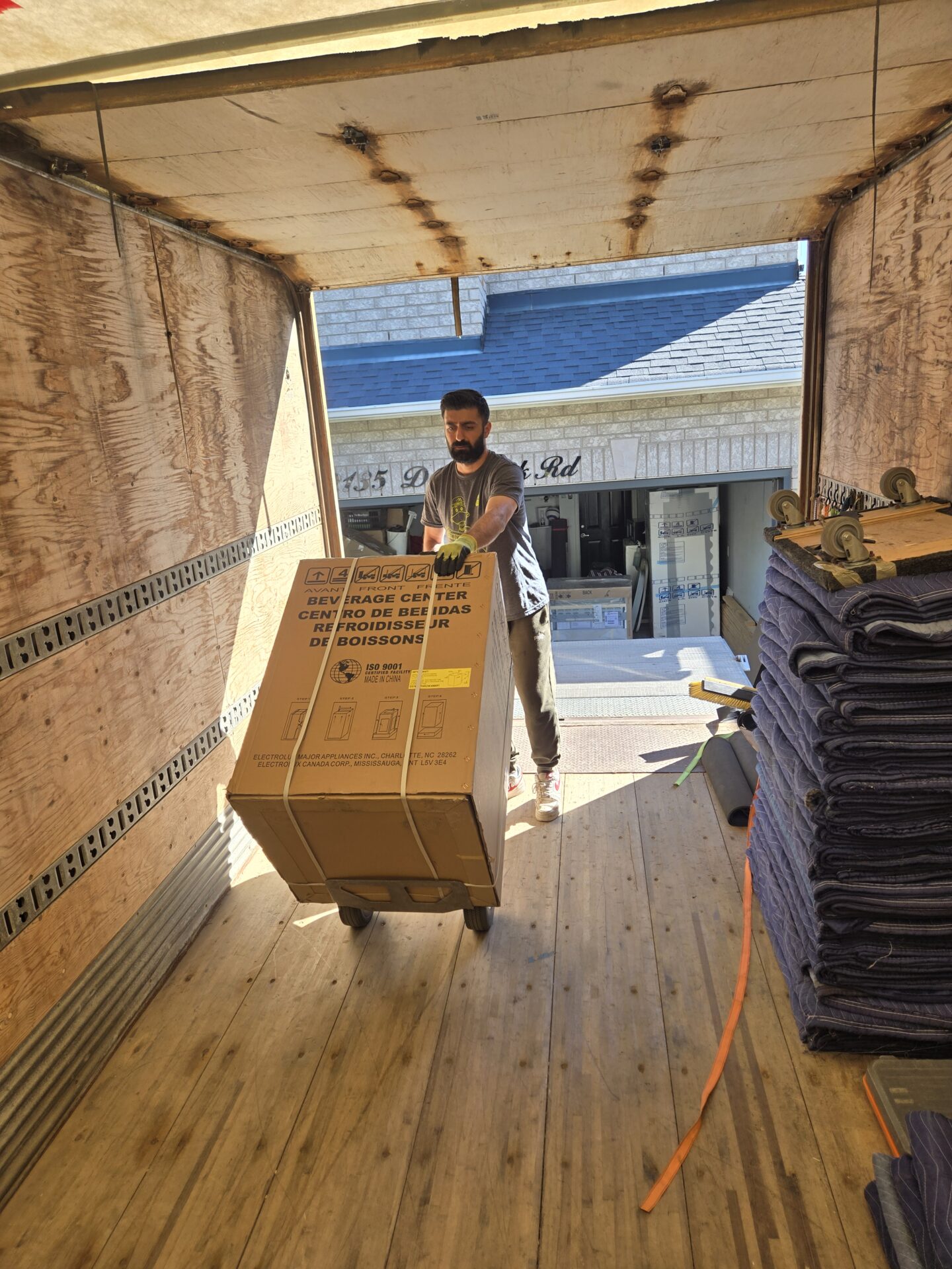 Moving truck parked safely at an Elmsdale property