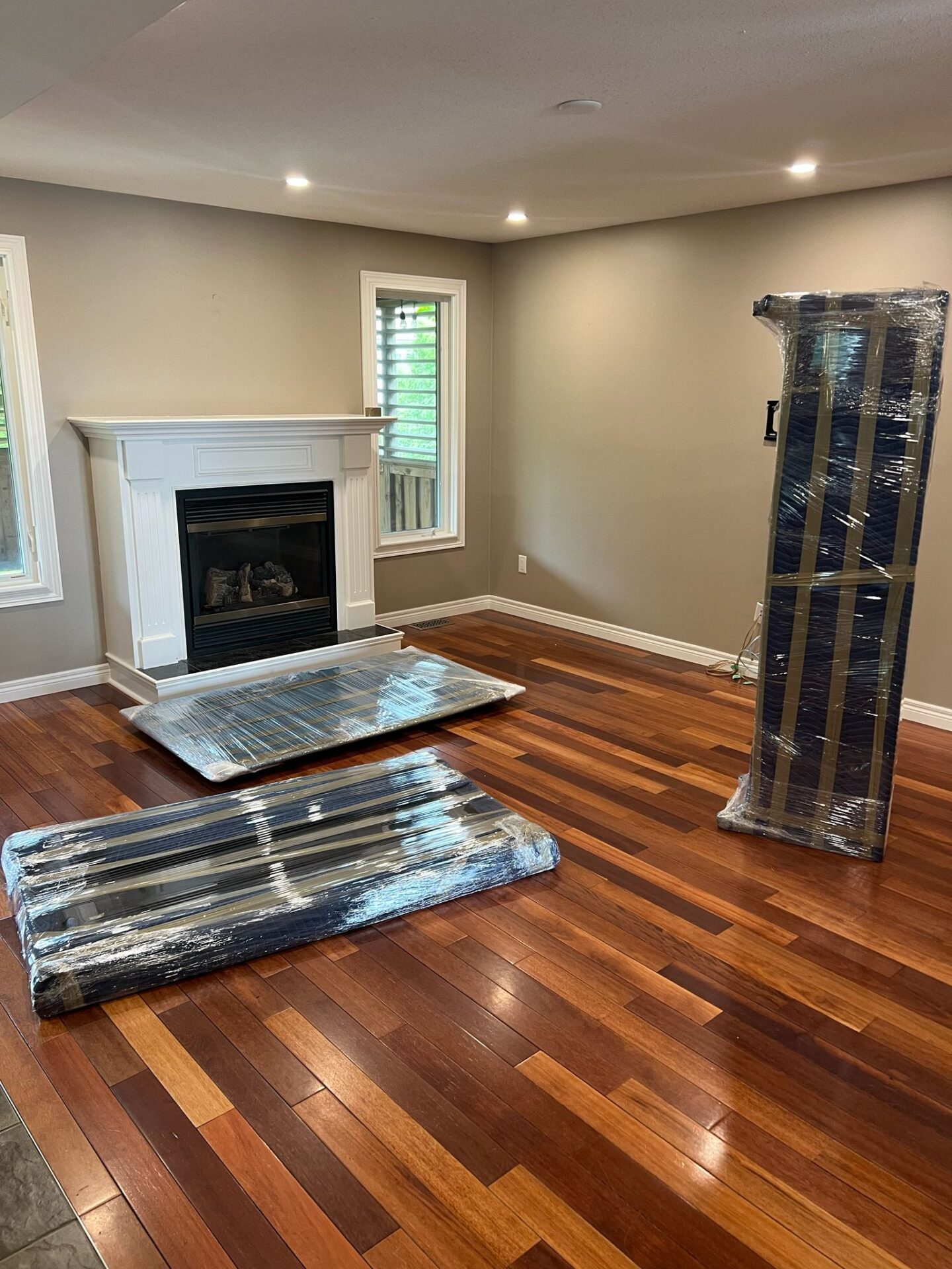 West Brant move completed — crew loading house