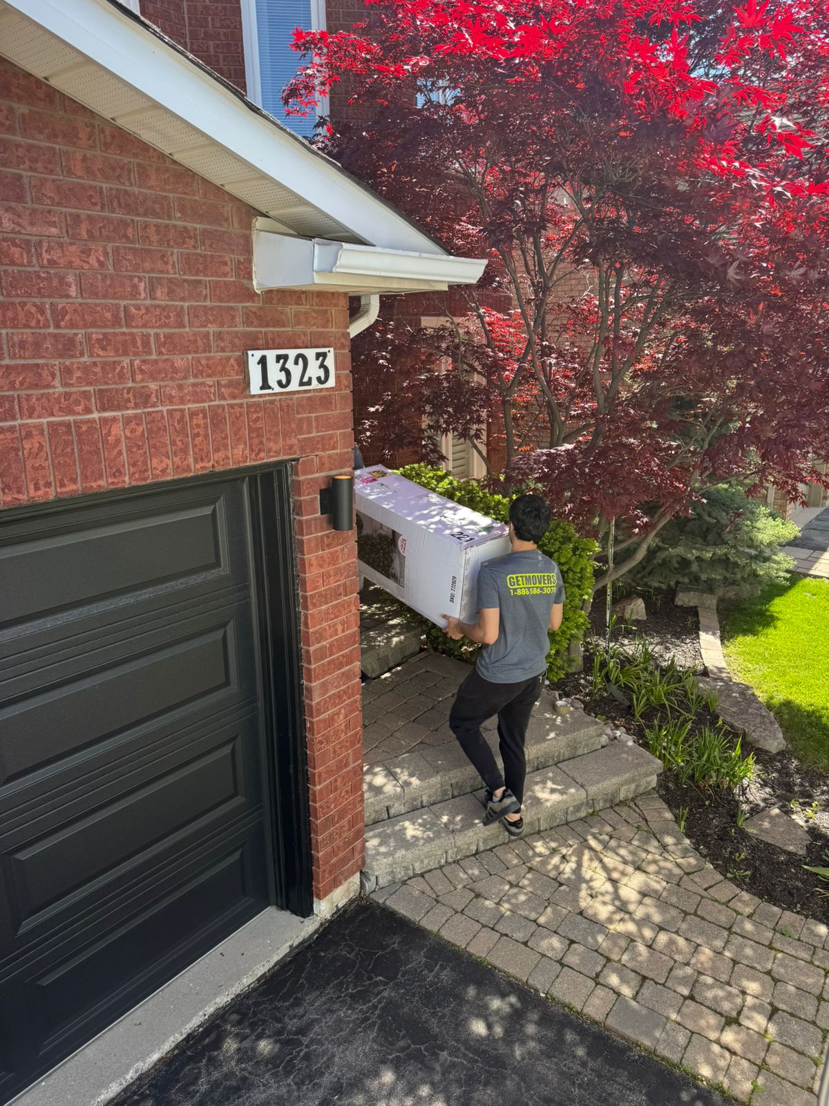 Movers delivering furniture to Spryfield