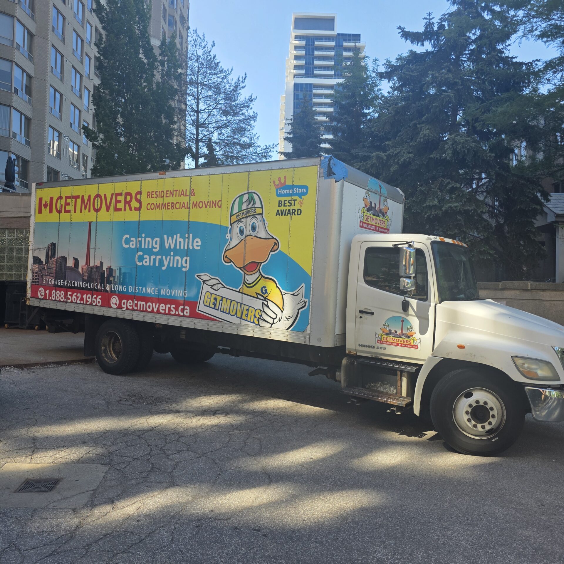 Movers delivering furniture into Eagle Place home