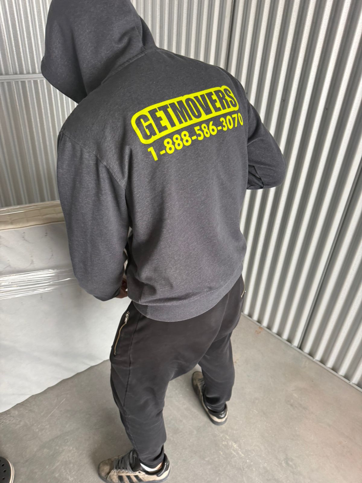 Condo move completed — movers loading truck