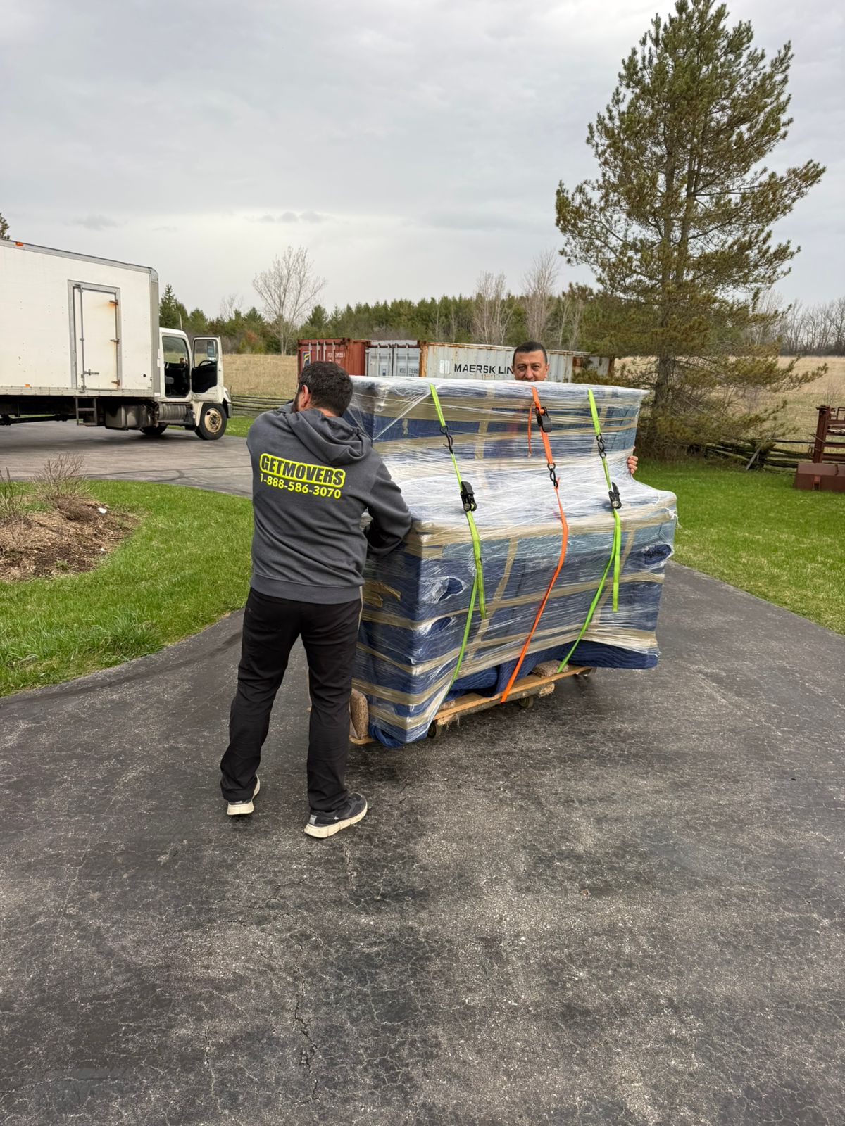 Cowie Hill move completed — crew loading apartment