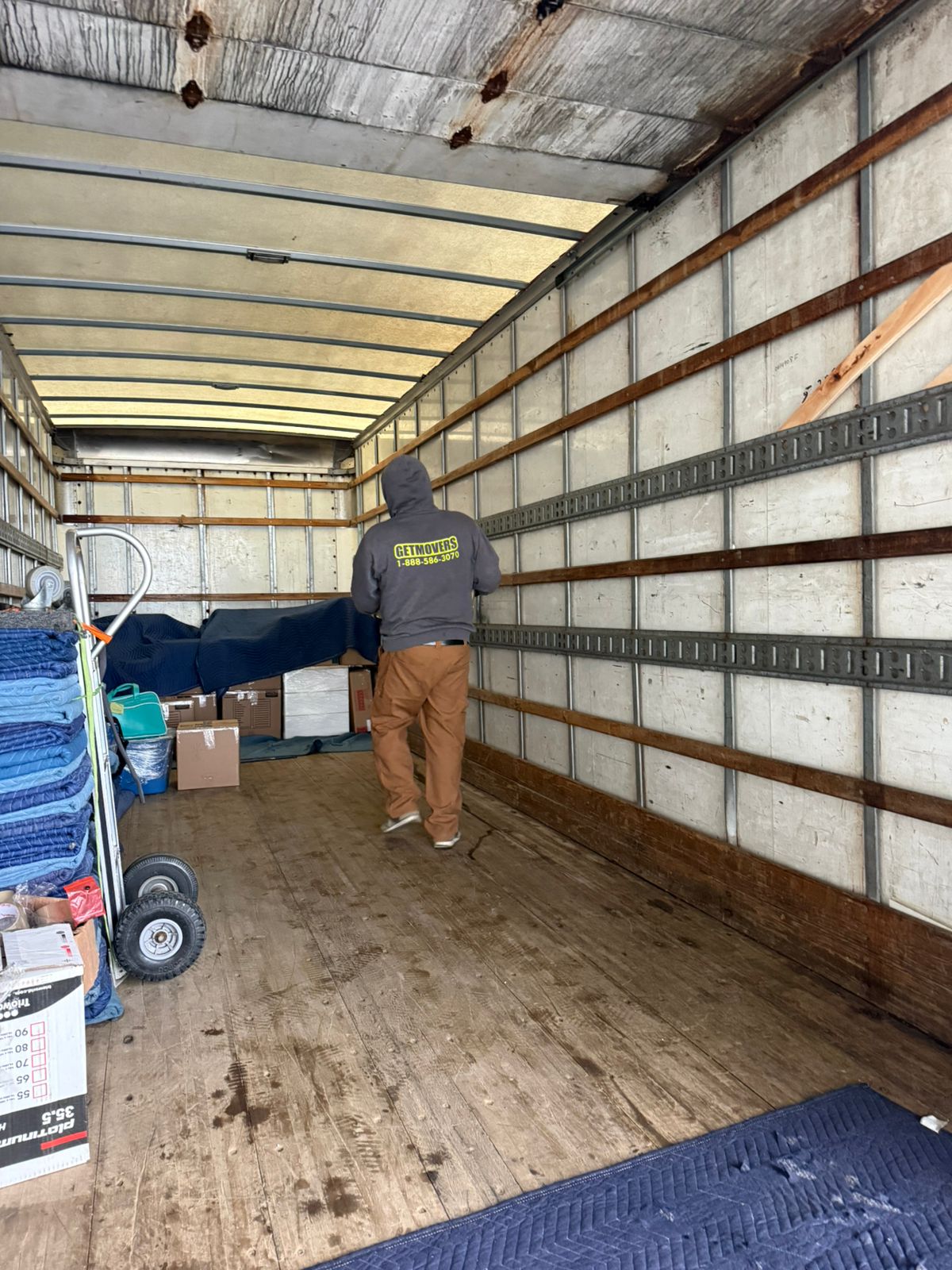 Forest Hills move completed — crew loading house