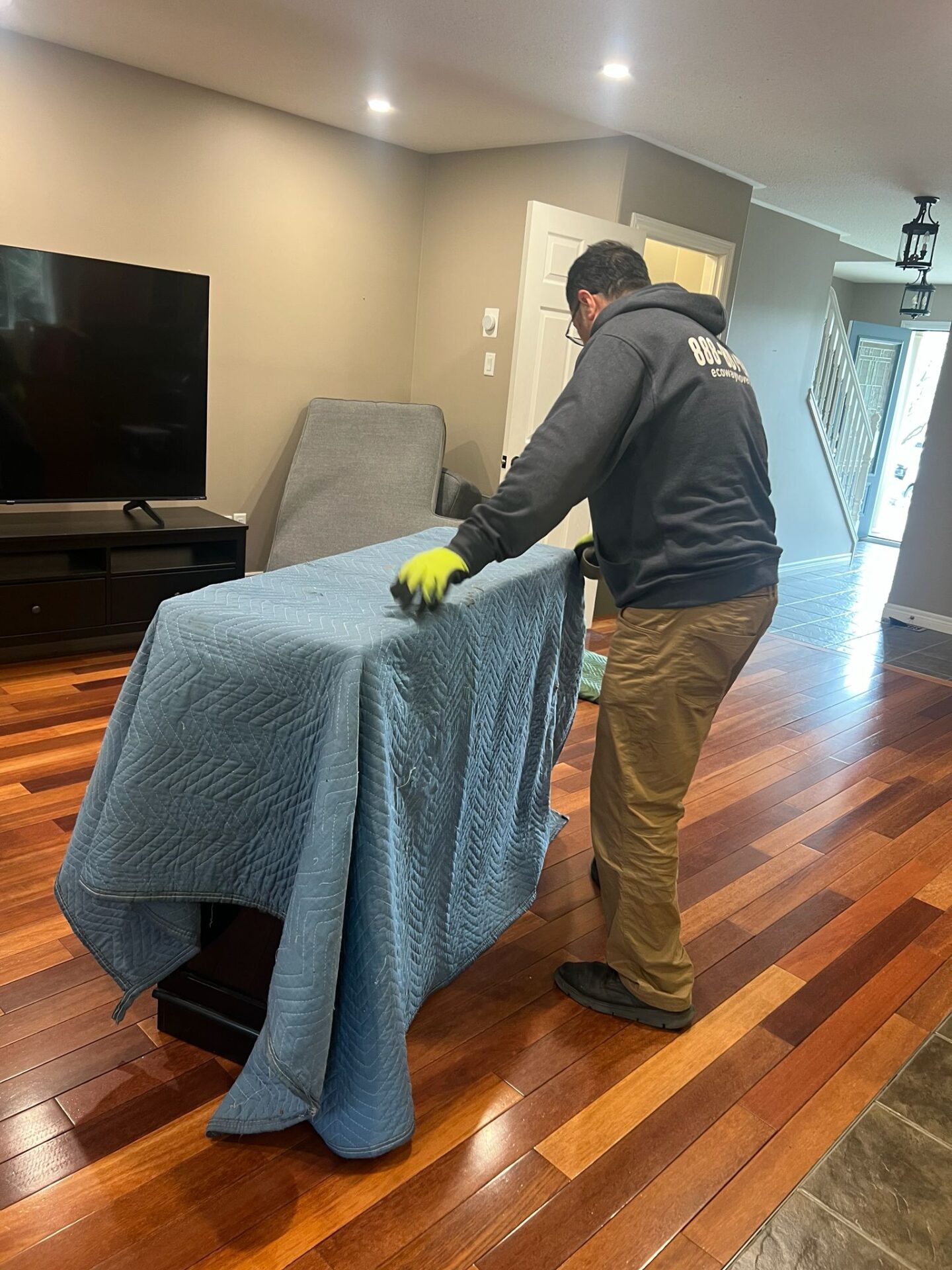 St. Paul Ave to Holmedale move — furniture delivery in progress