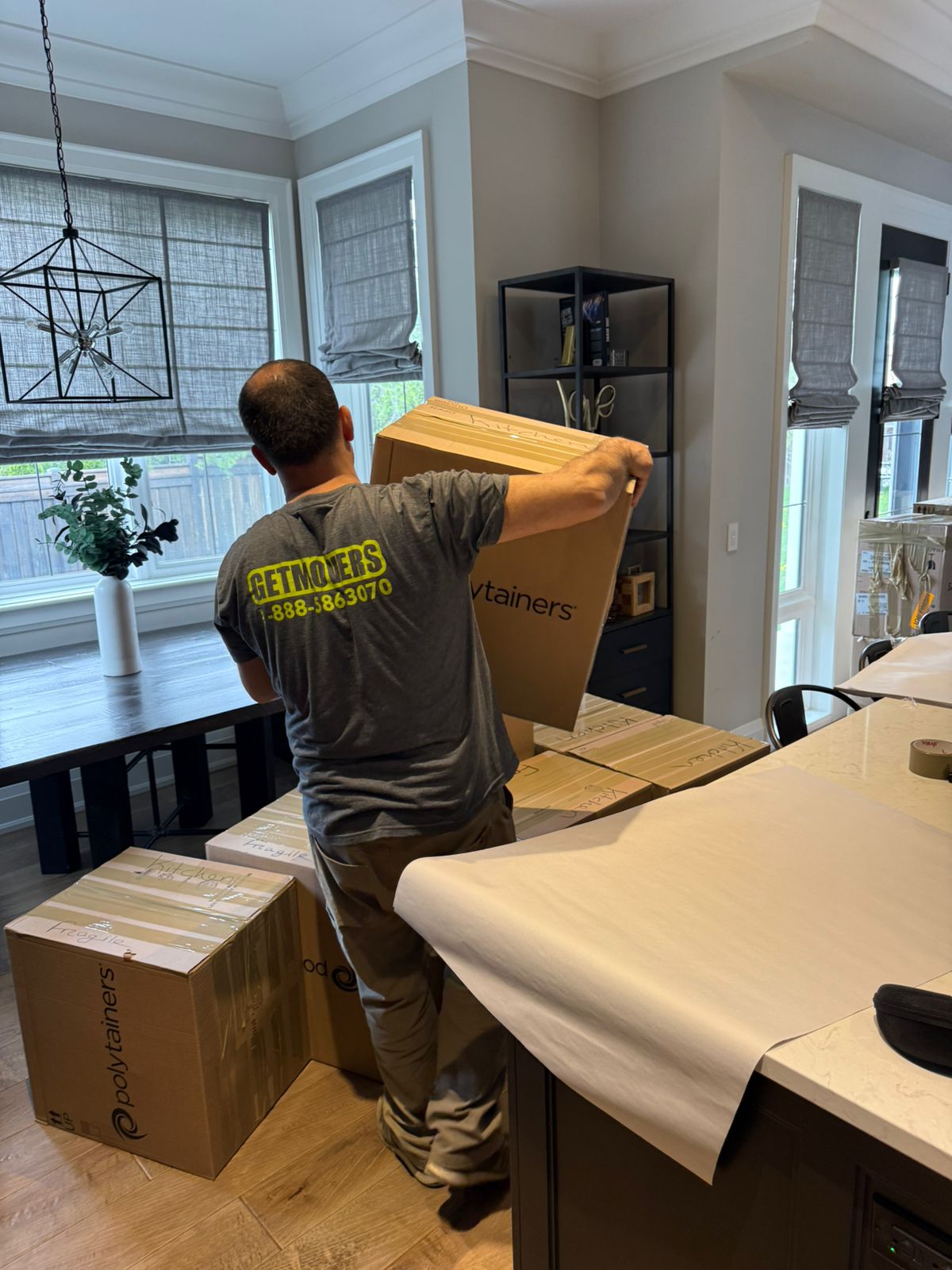 Hubbards move completed — crew loading bungalow