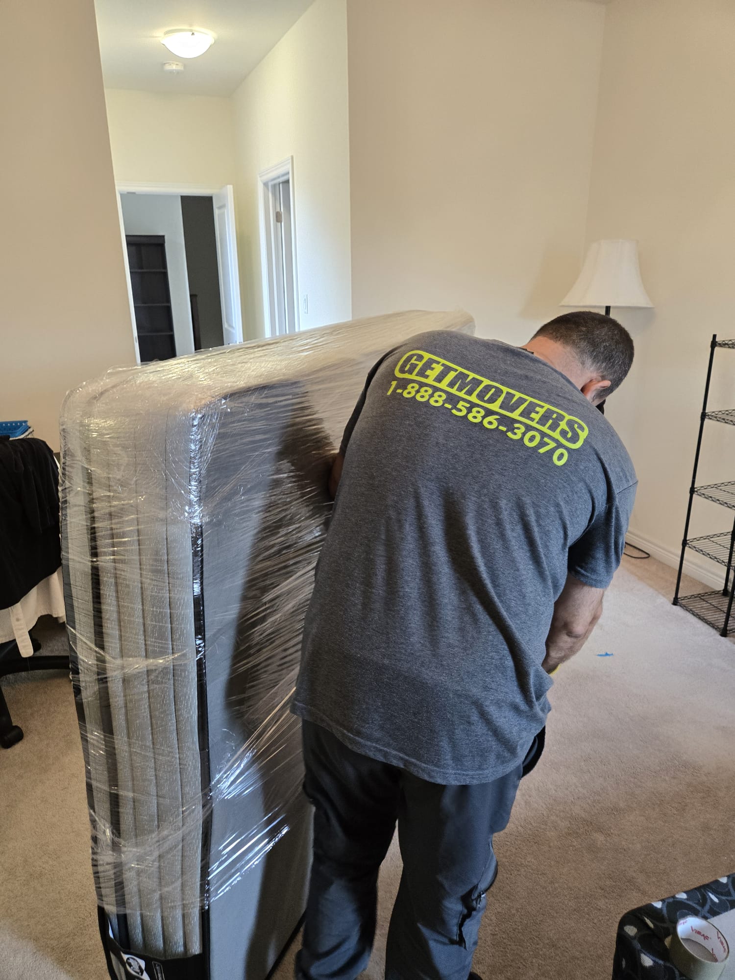 Get Movers Oshawa ON crew loading truck