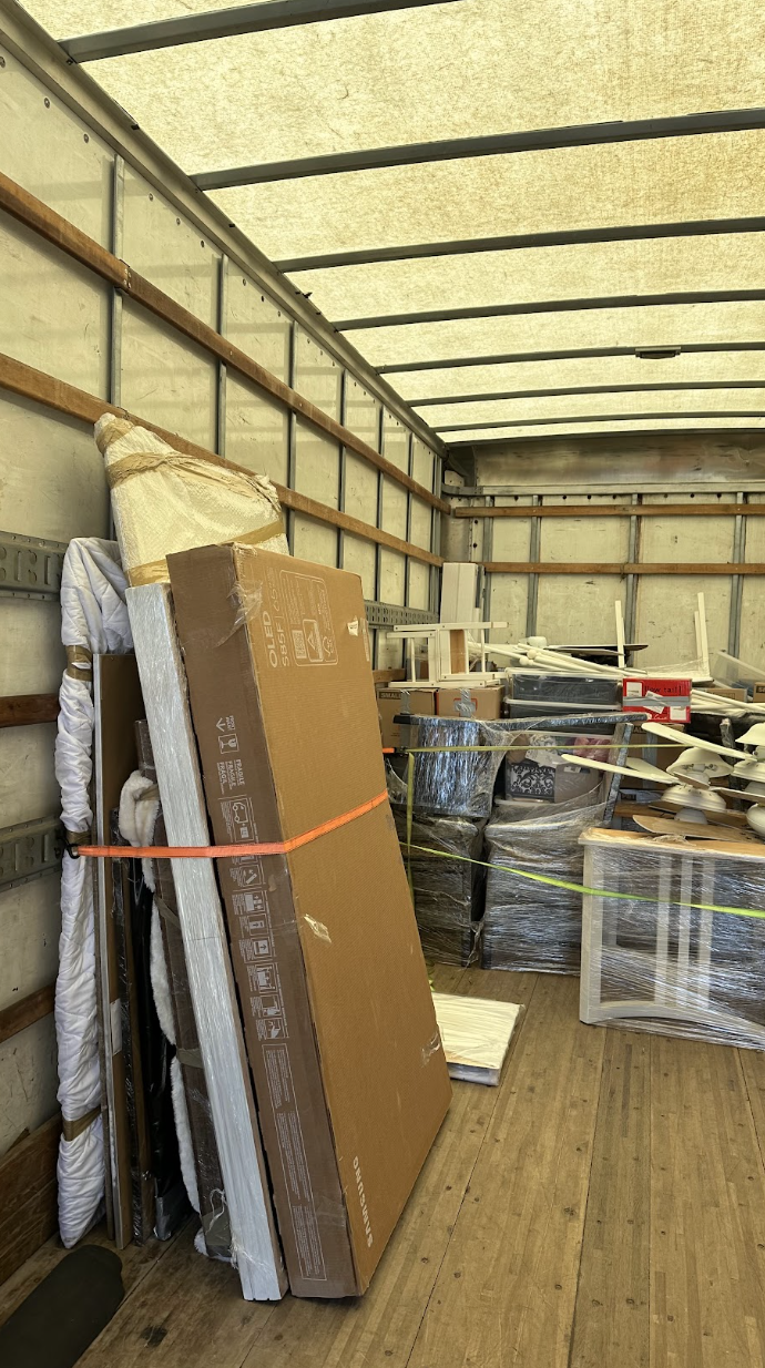 Bear Mountain move completed — crew loading townhome