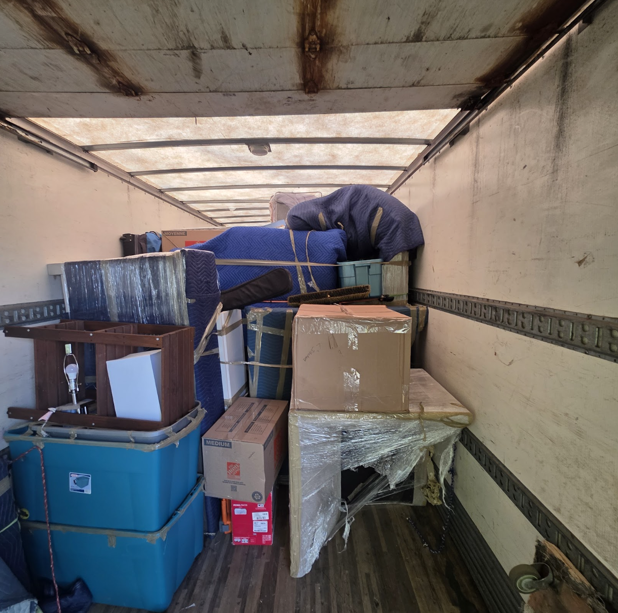 Harris Green move completed — crew loading condo
