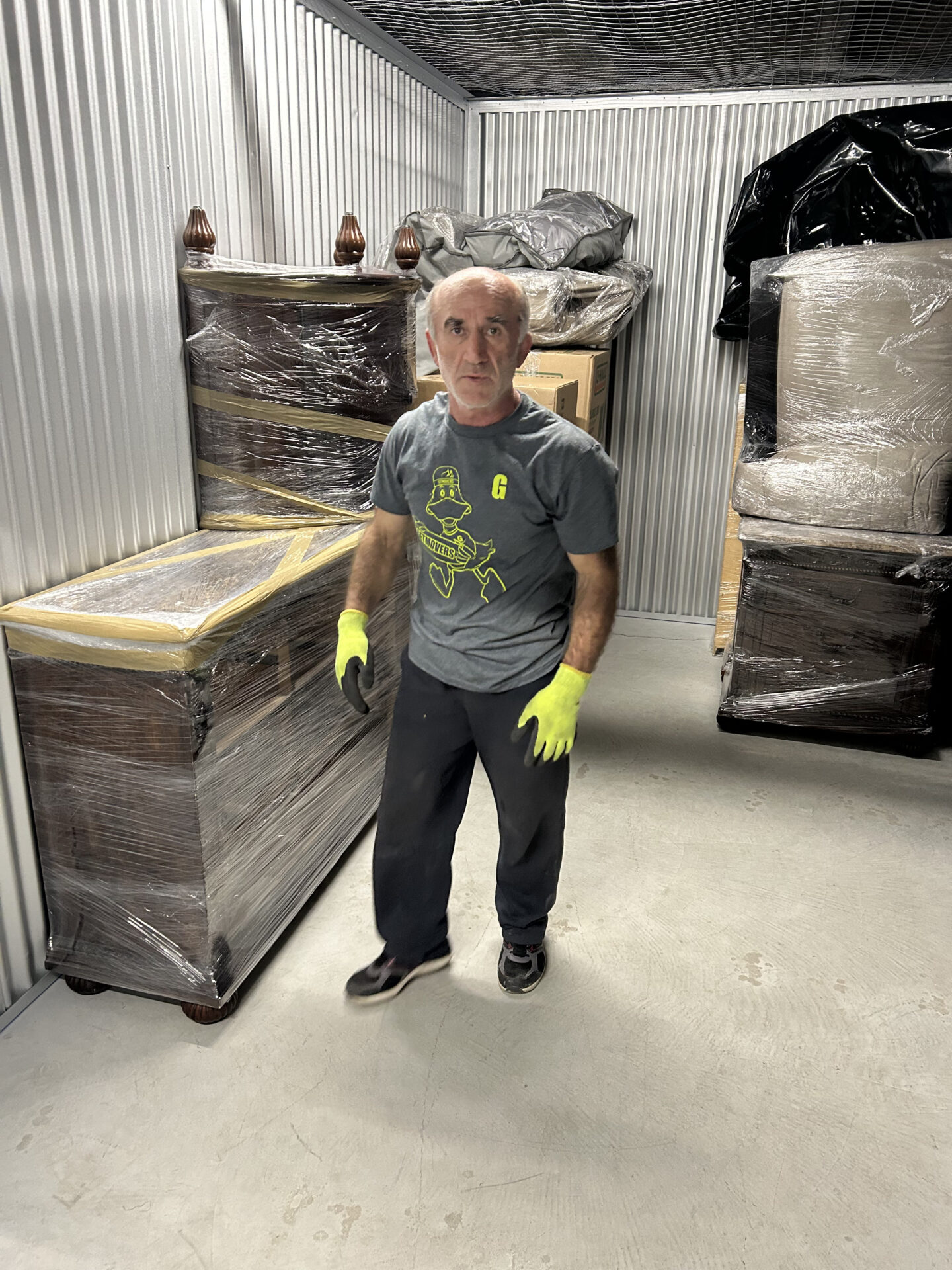 Moving furniture carefully at a Port Union property