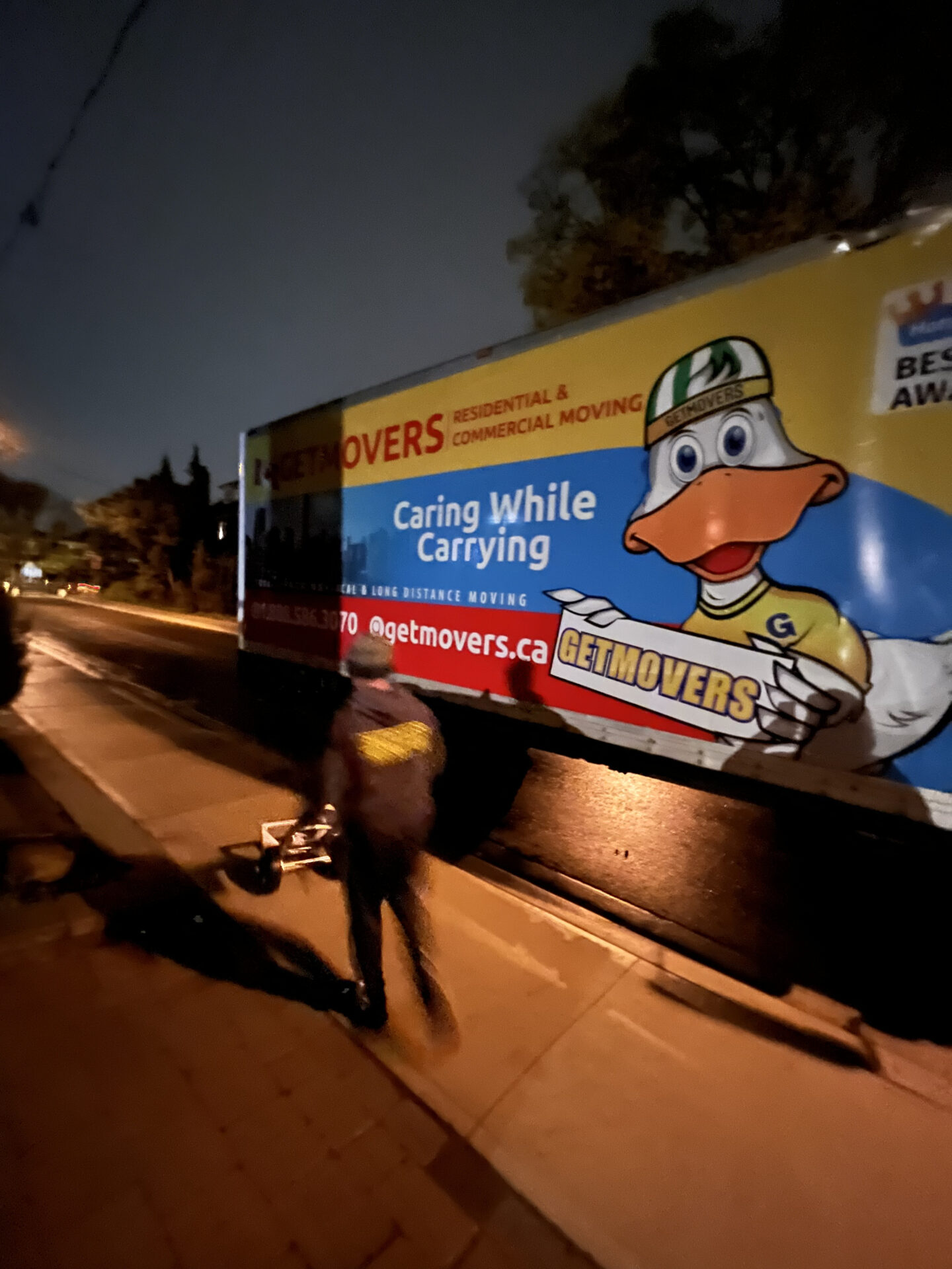 Truck positioned securely on a quiet Northglen street
