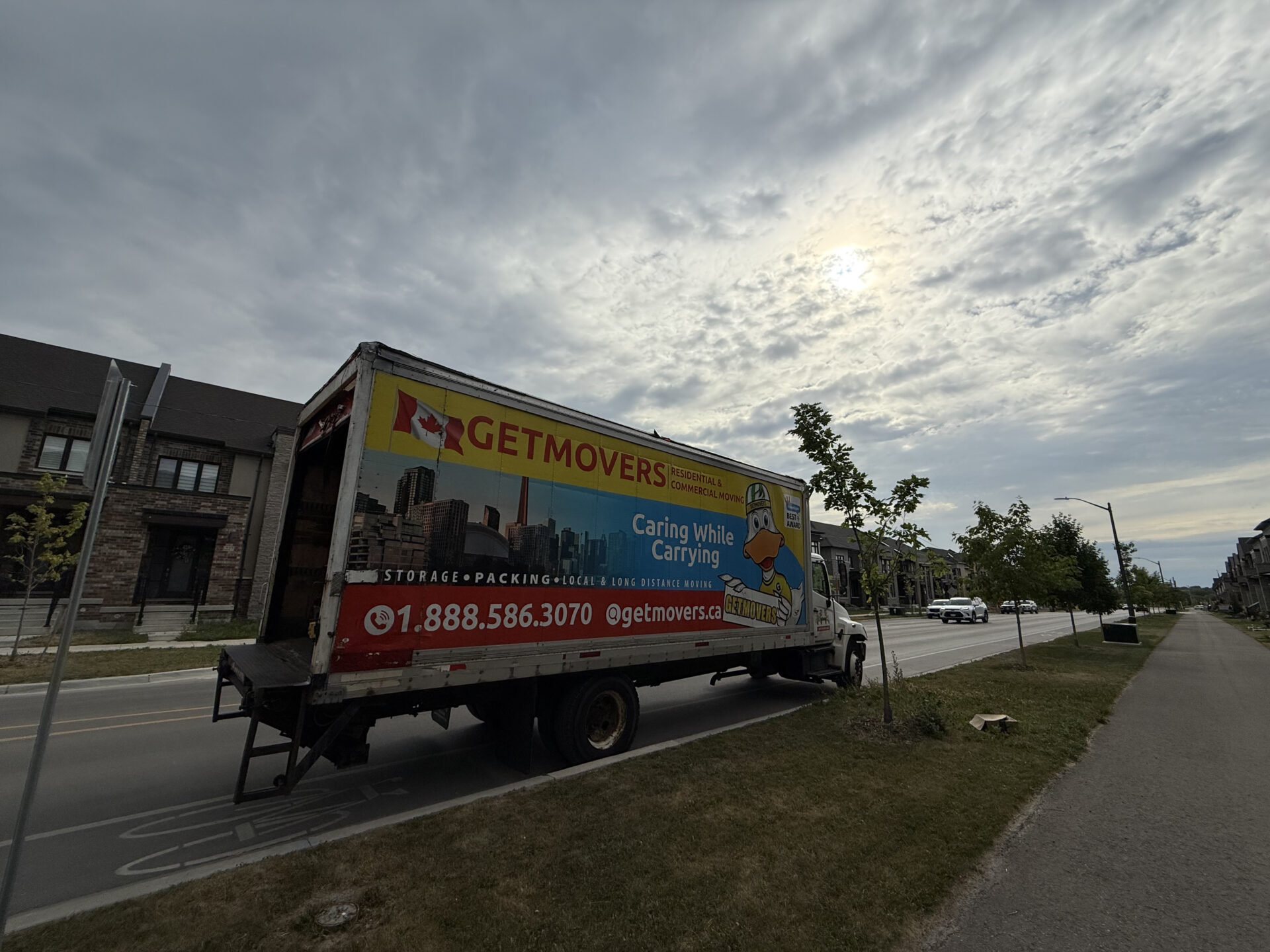 Windfields move completed — crew loading townhome