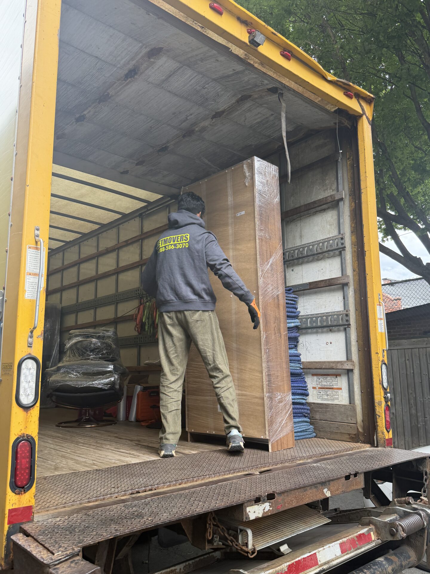 Moving truck safely loaded and strapped at condo building