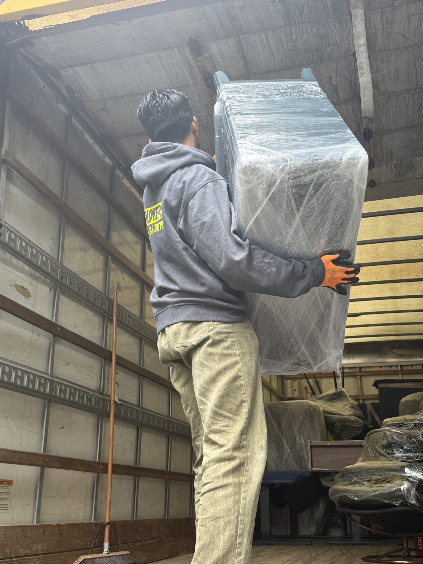 Unloading furniture into Central Oshawa residence