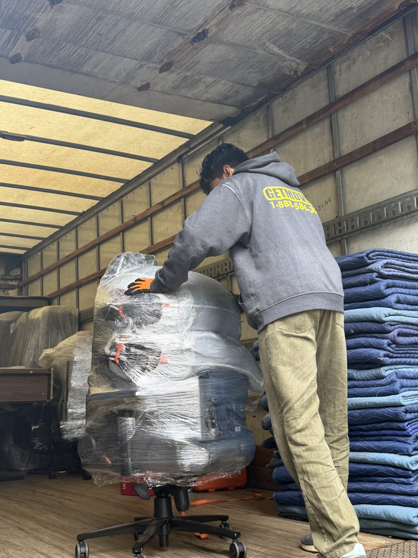 Moving truck safely parked near historic downtown home