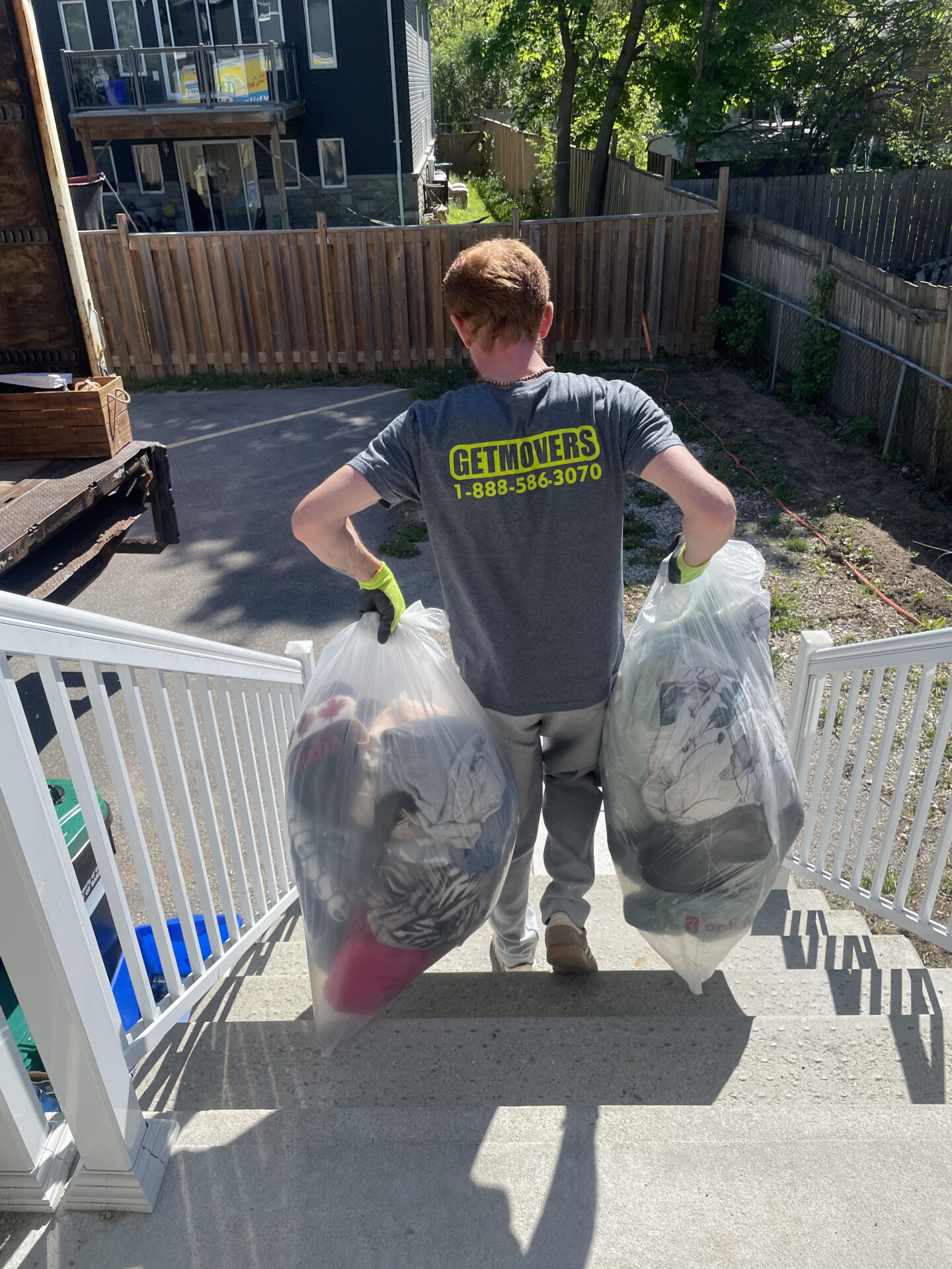 Get Movers crew protecting floors and wrapping furniture in Parkdale
