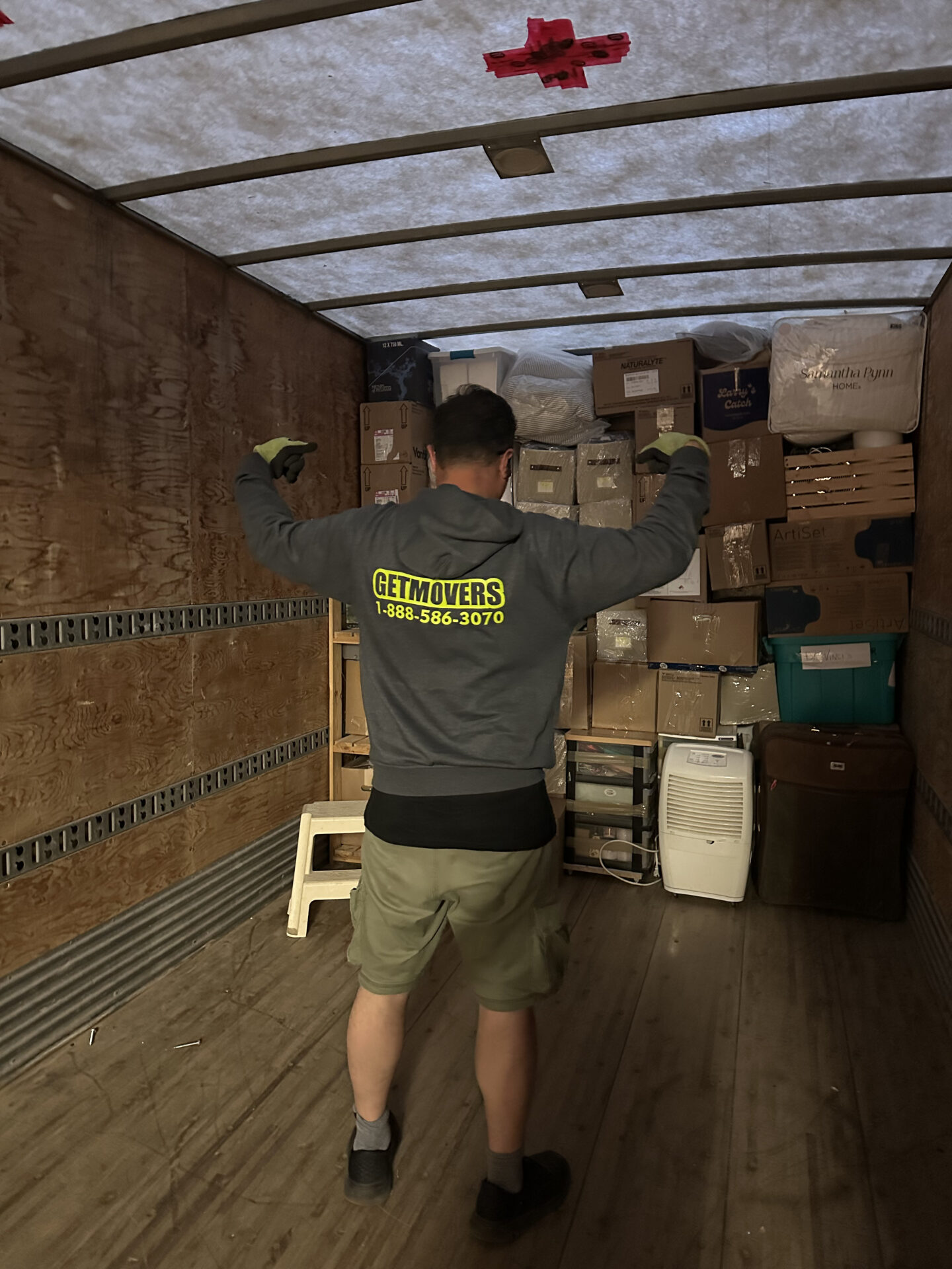 Moving company protecting hardwood floors during Greenbrier relocation