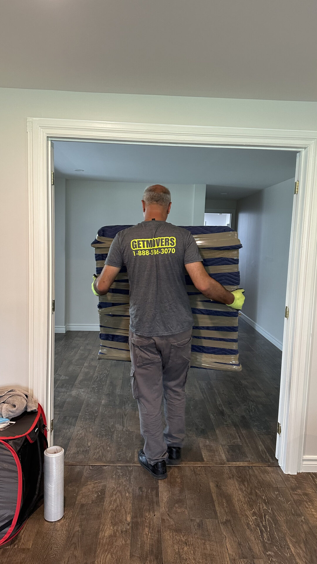 Movers protecting furniture during Bendale drop-off