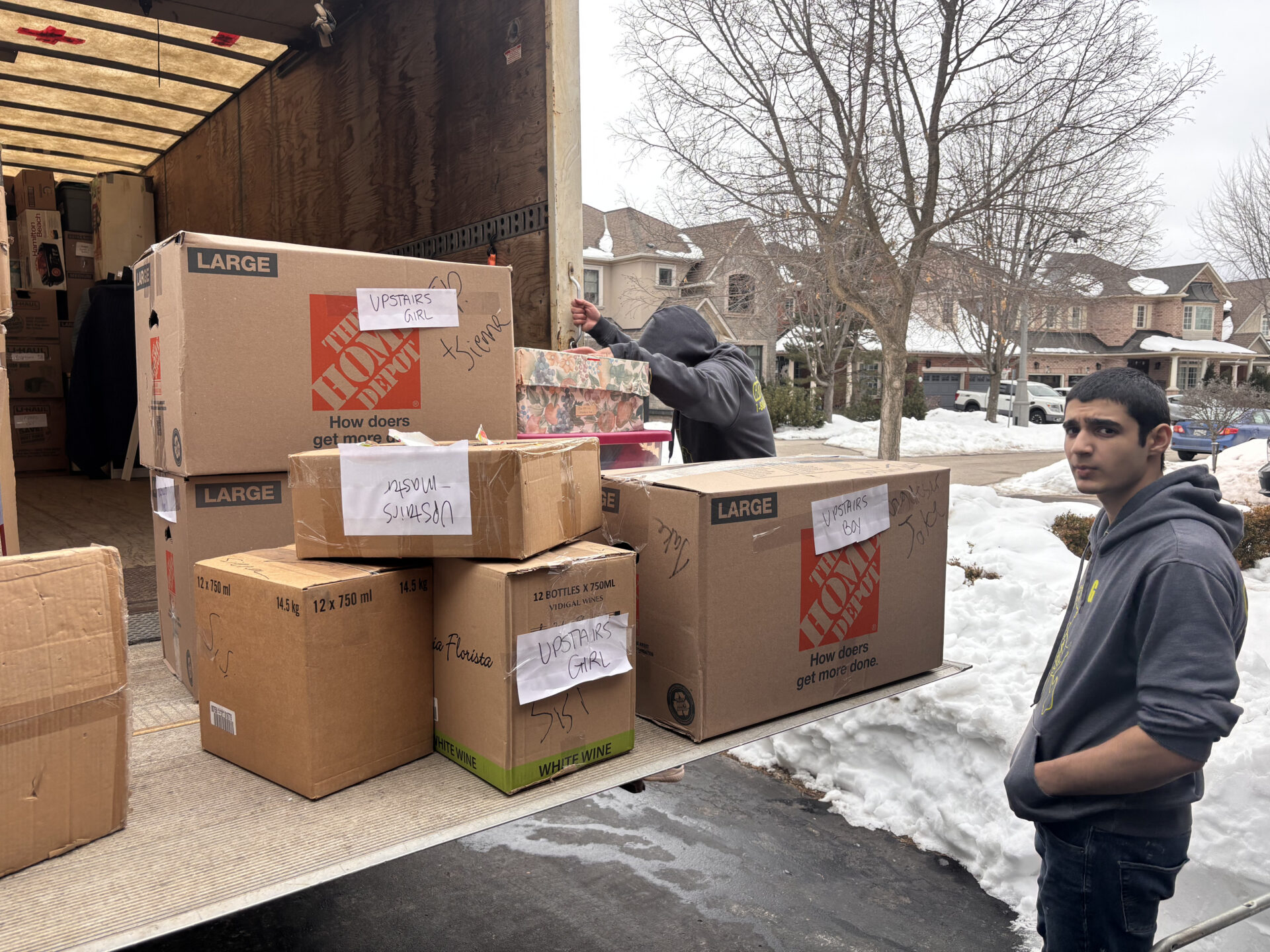Moving truck parked on Northwood Dr during a local move