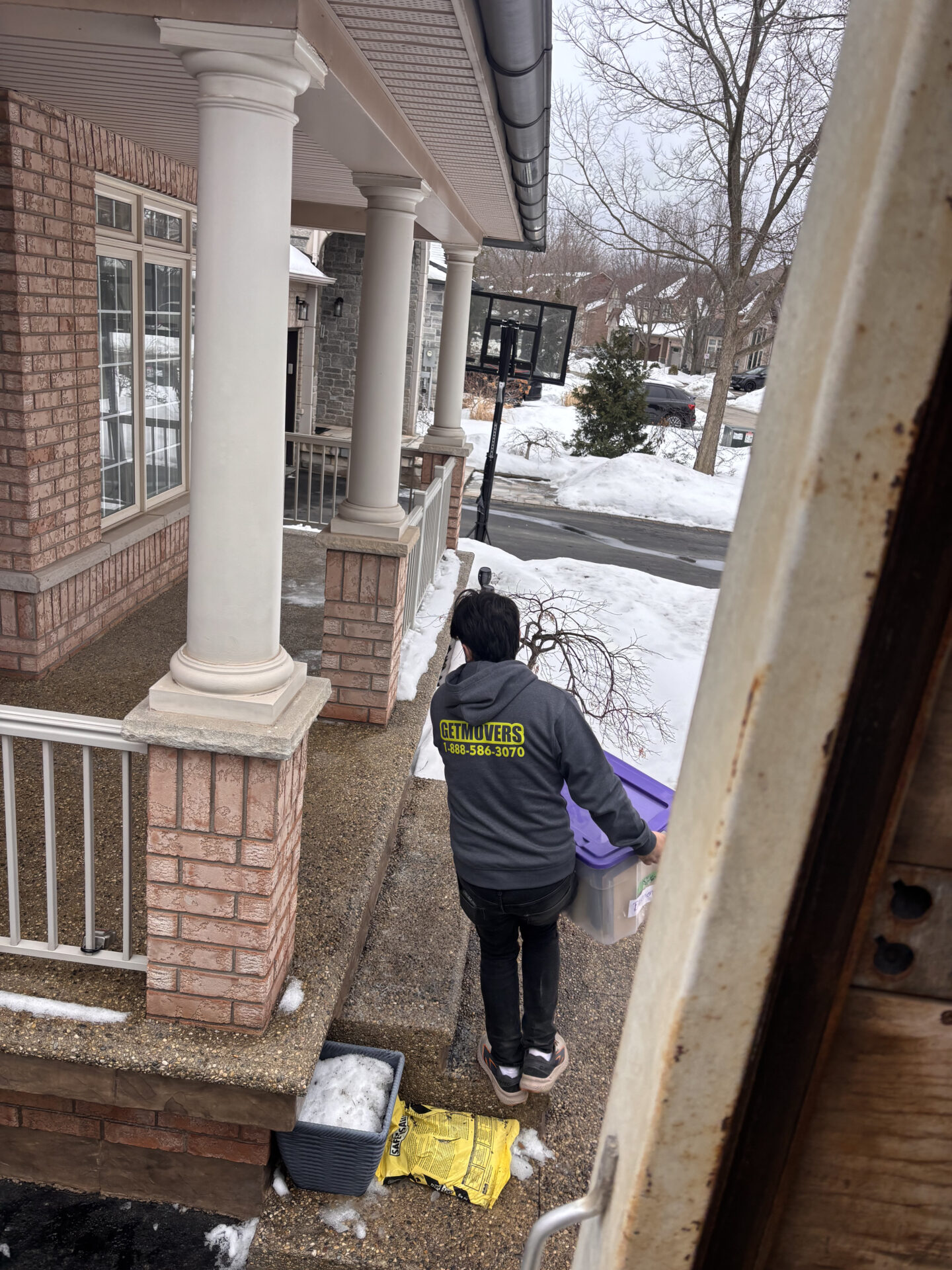 Centennial move completed — crew loading house