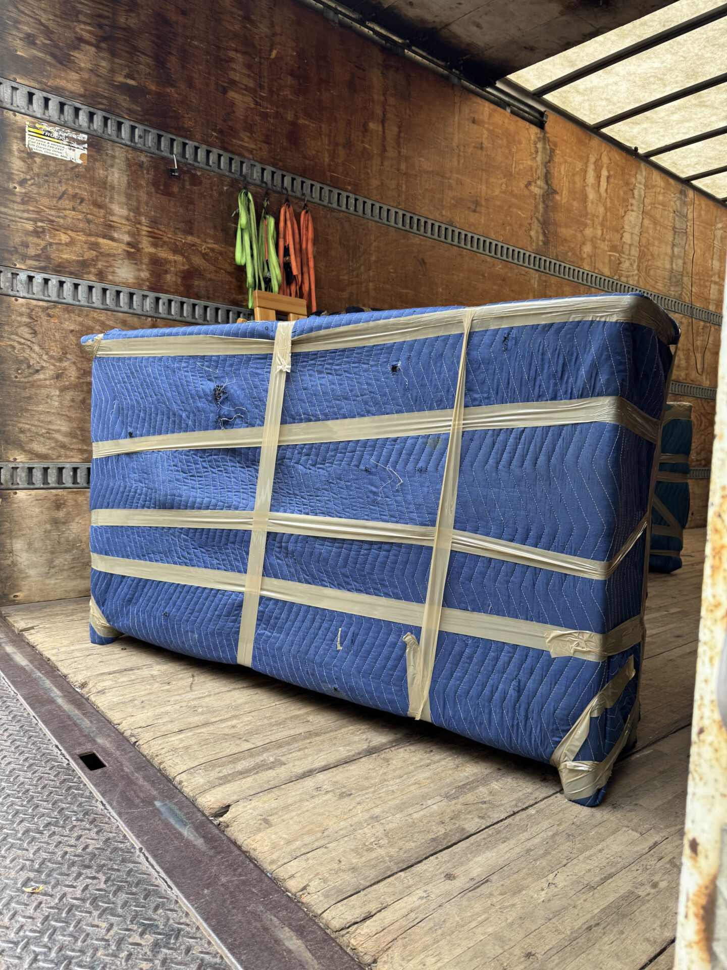 Get Movers Oshawa ON loading truck on Britannia Ave