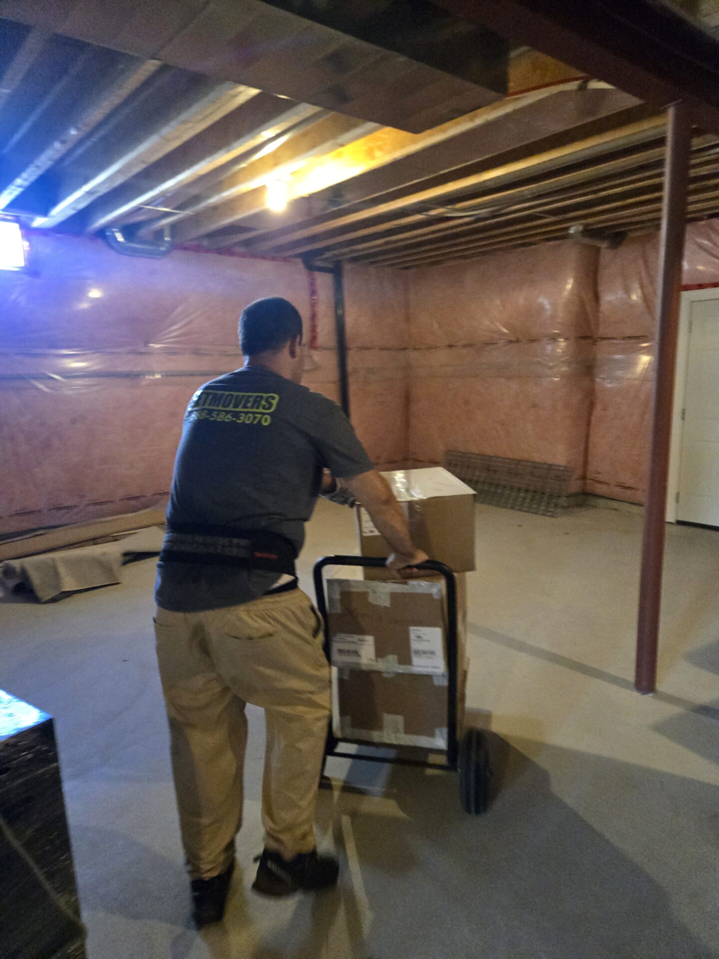Movers wrapping furniture in South Richvale