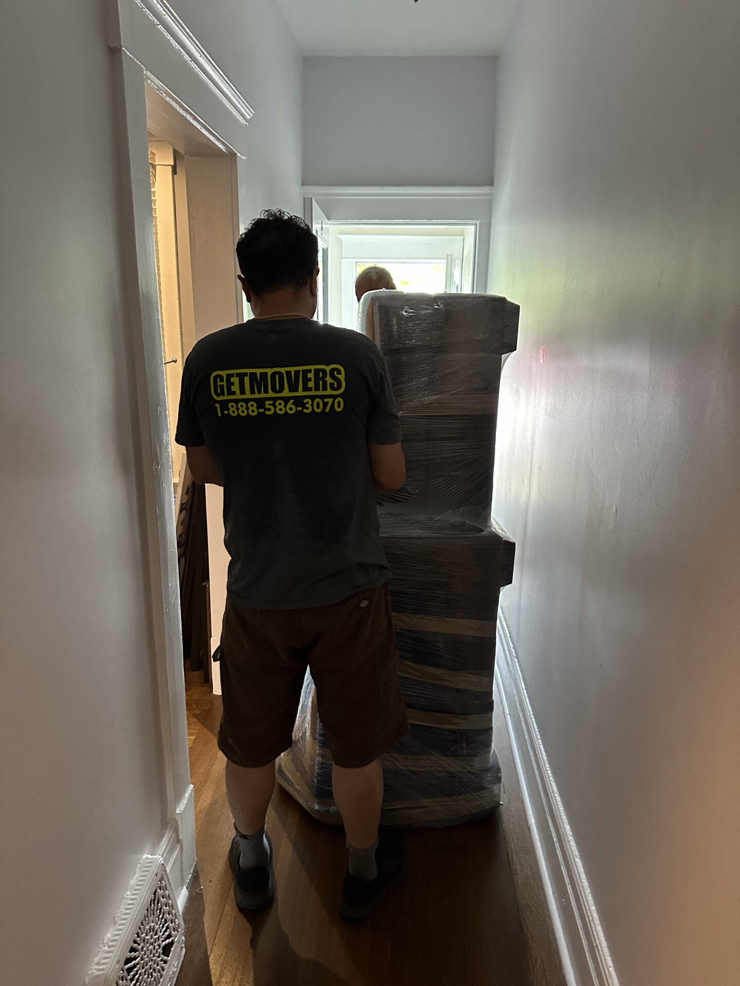 Get Movers Oshawa ON loading truck in Columbus West