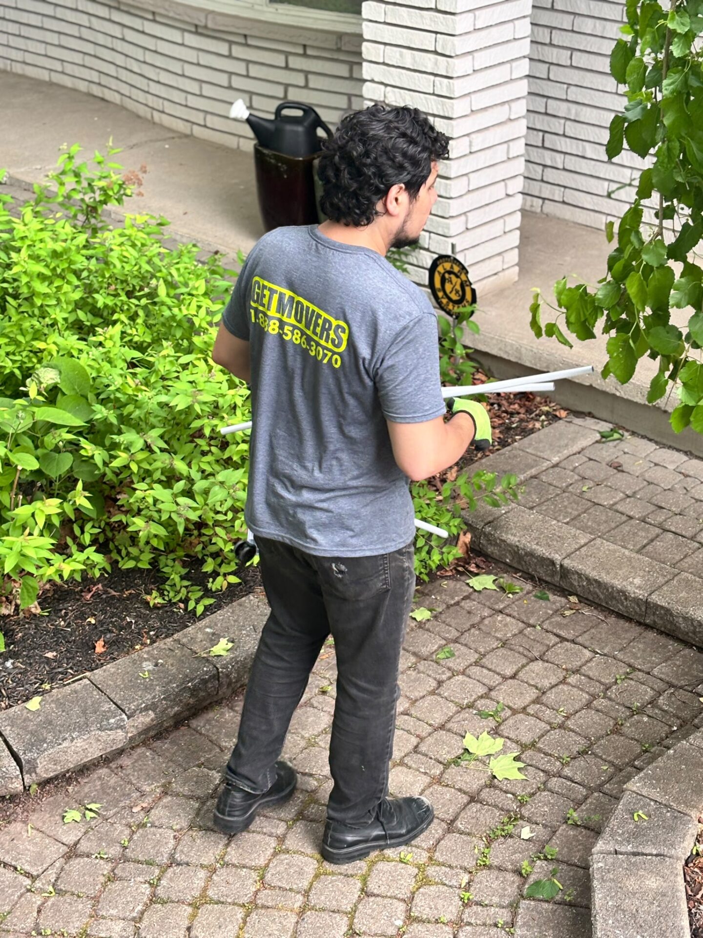 Get Movers Montreal professional movers loading a truck for a local residential move in Dorval, Montreal