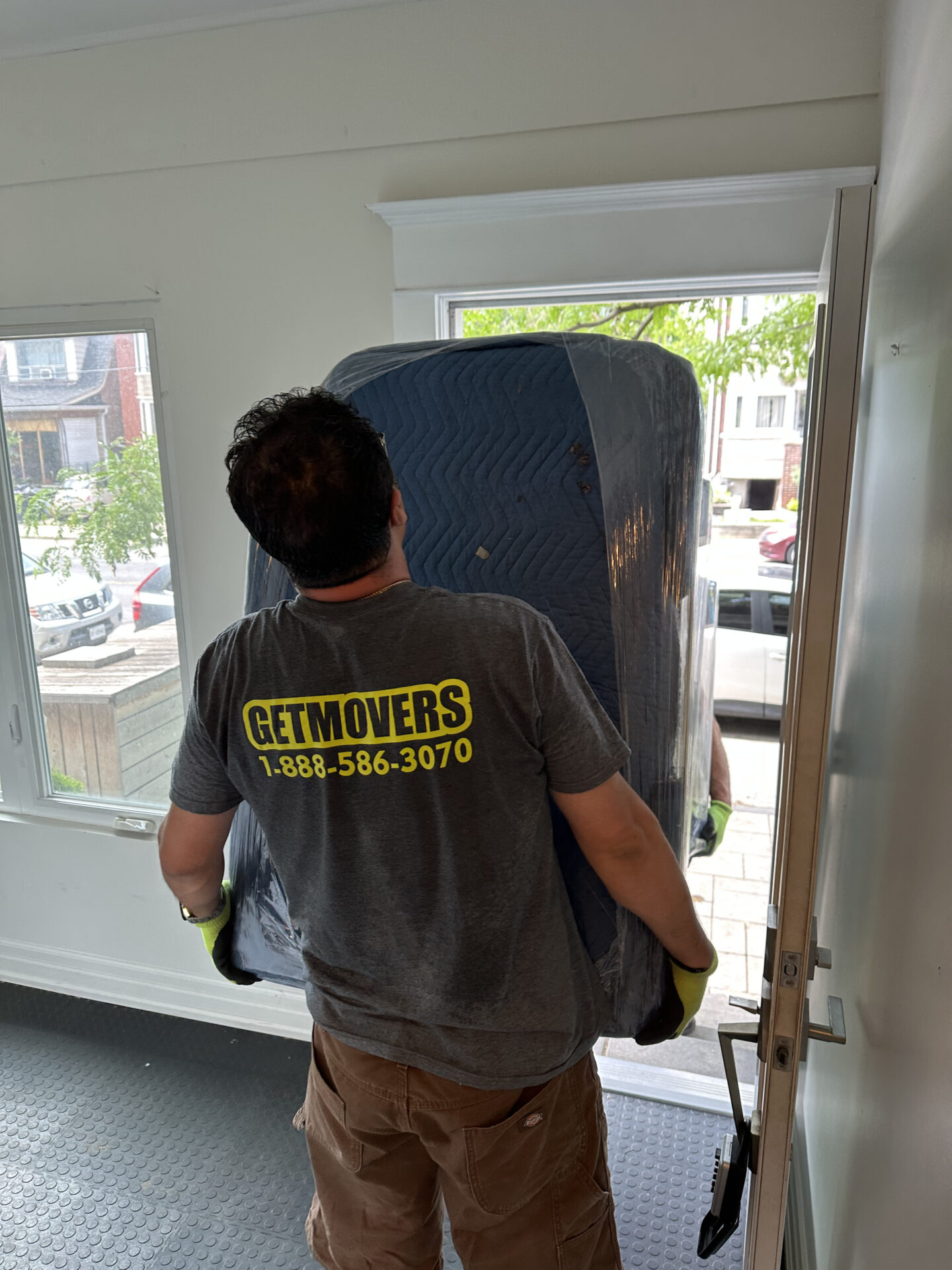 Bloor West move completed — crew loading bungalow