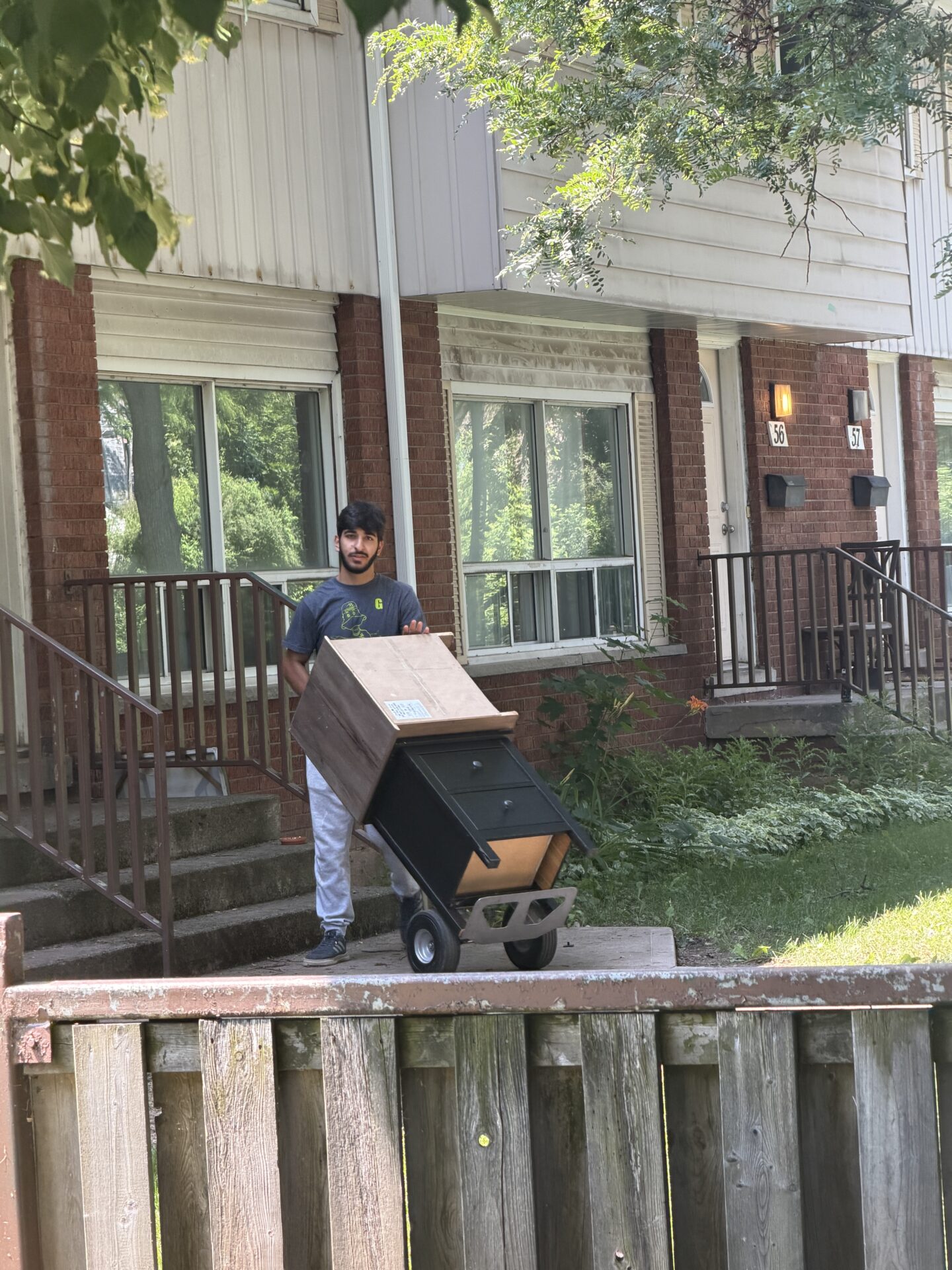 Movers protecting townhouse entrance in Thickson