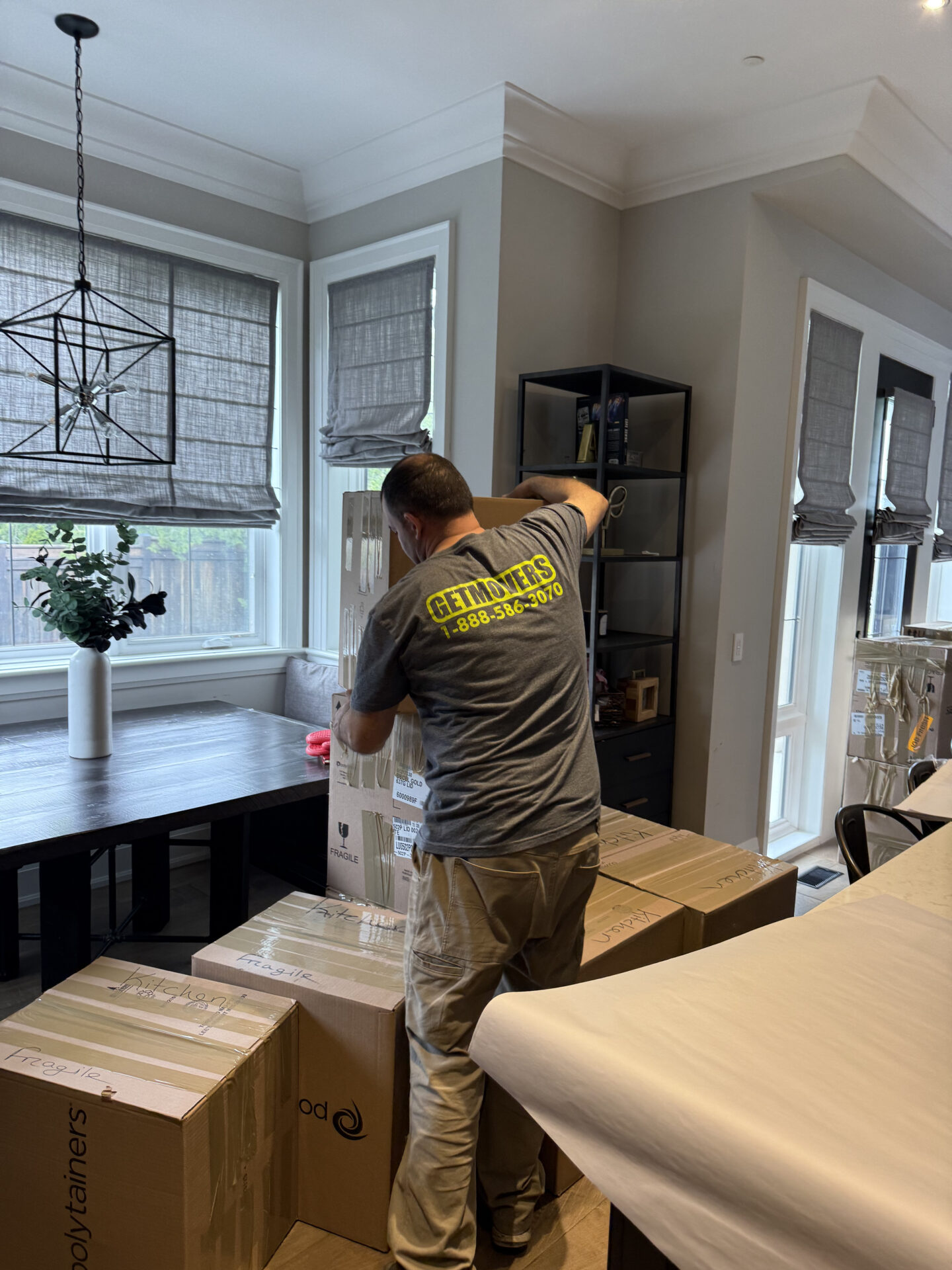 Moving from Harmony Rd N — boxed items ready for transport