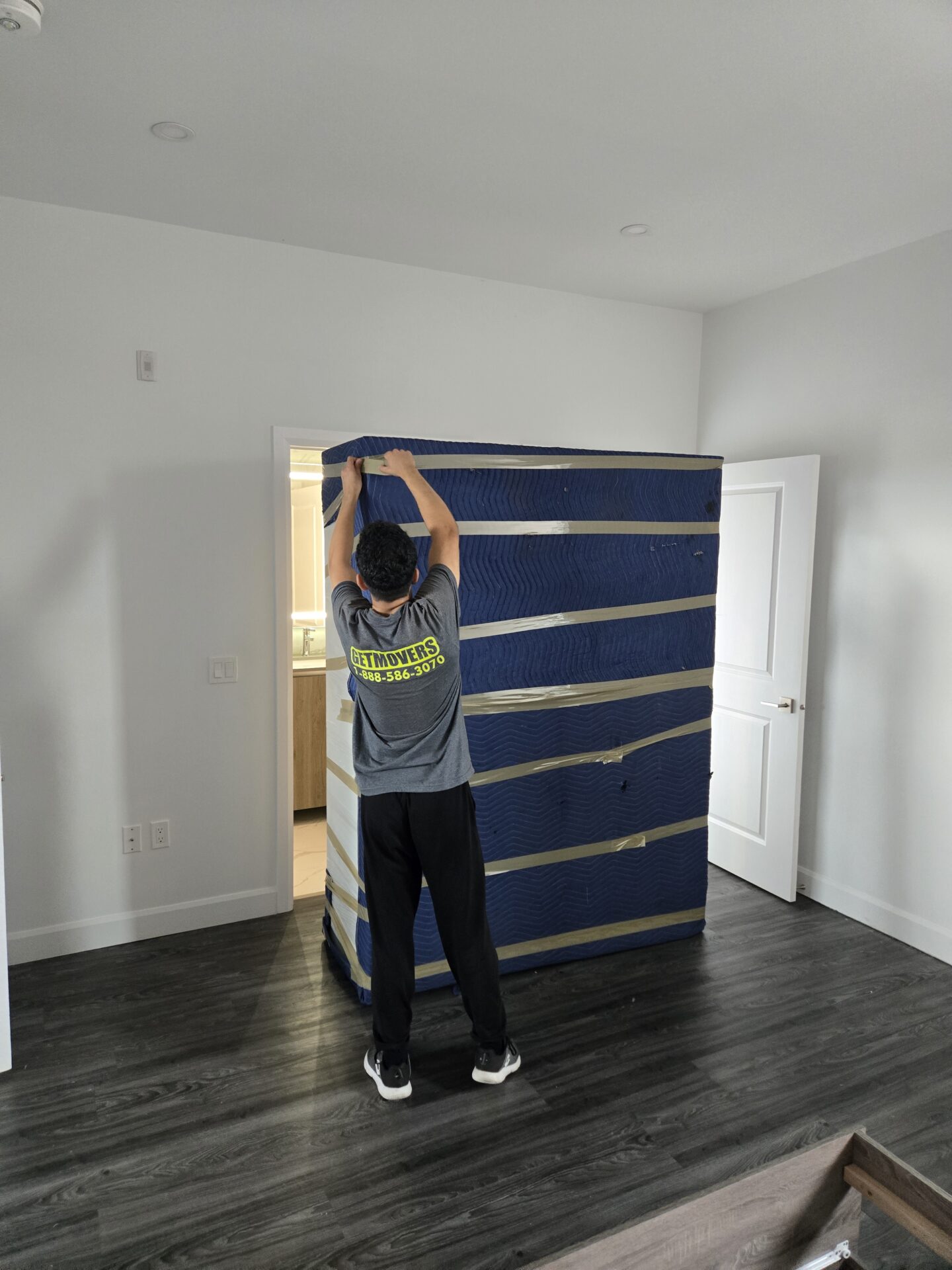 Get Movers Oshawa ON crew loading furniture in Bowmanville