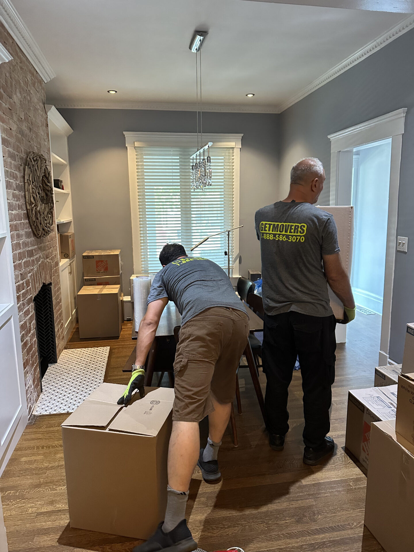 Simcoe South move completed — movers loading apartment