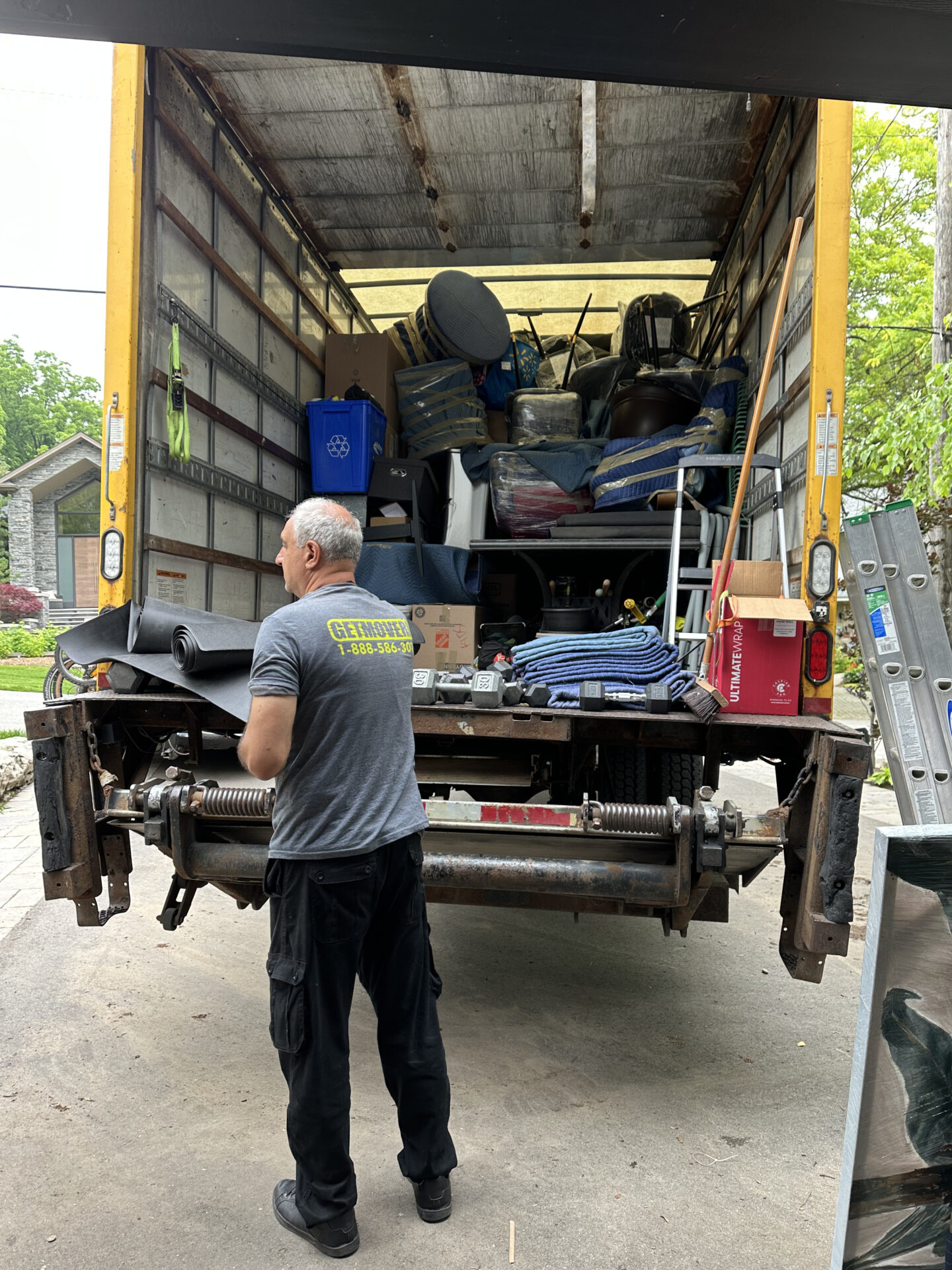 Movers unloading truck in North Oshawa