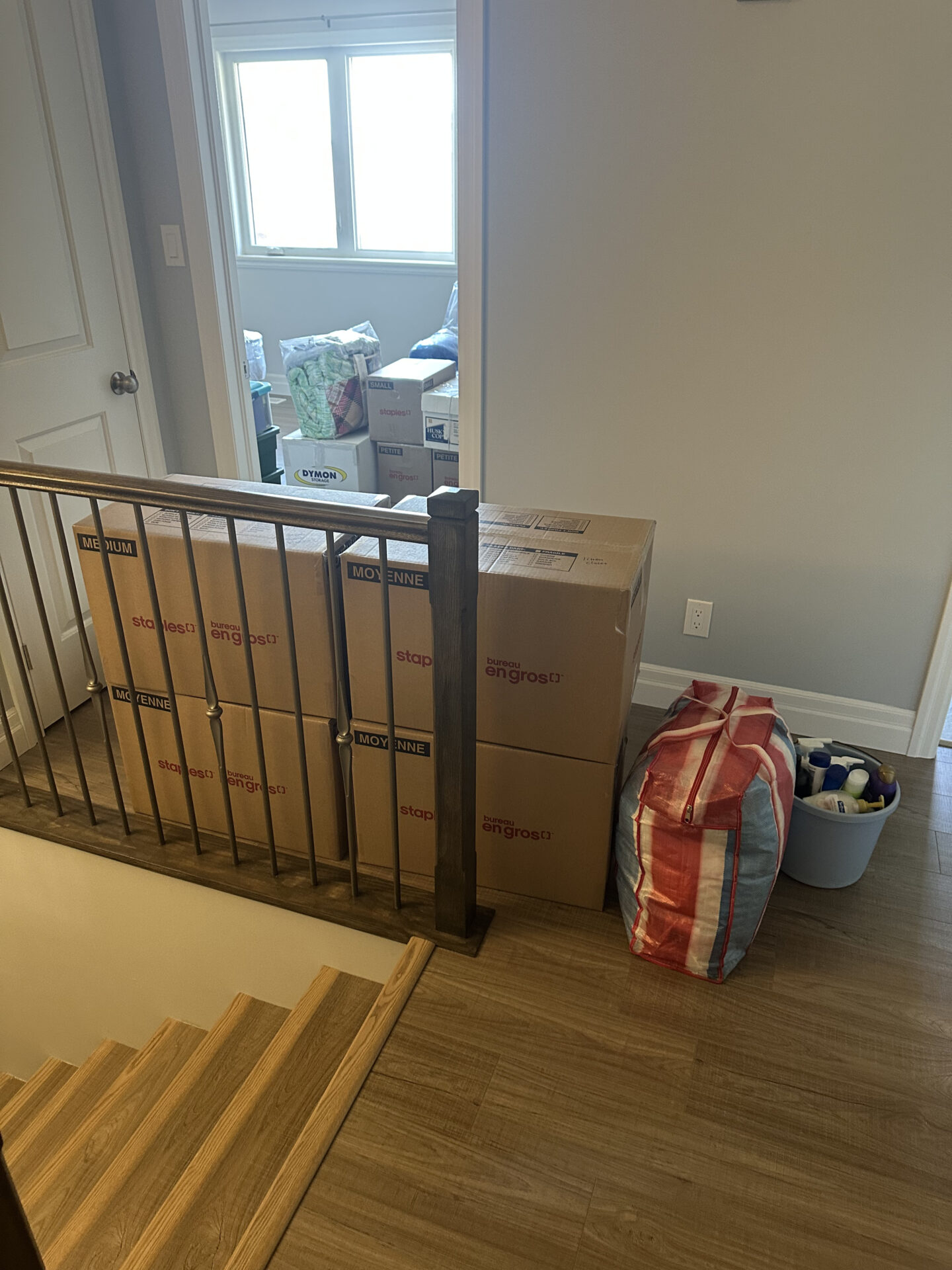 Get Movers Edmonton AB deploying neoprene floor runners and securing payload for Cumberland townhome residential move