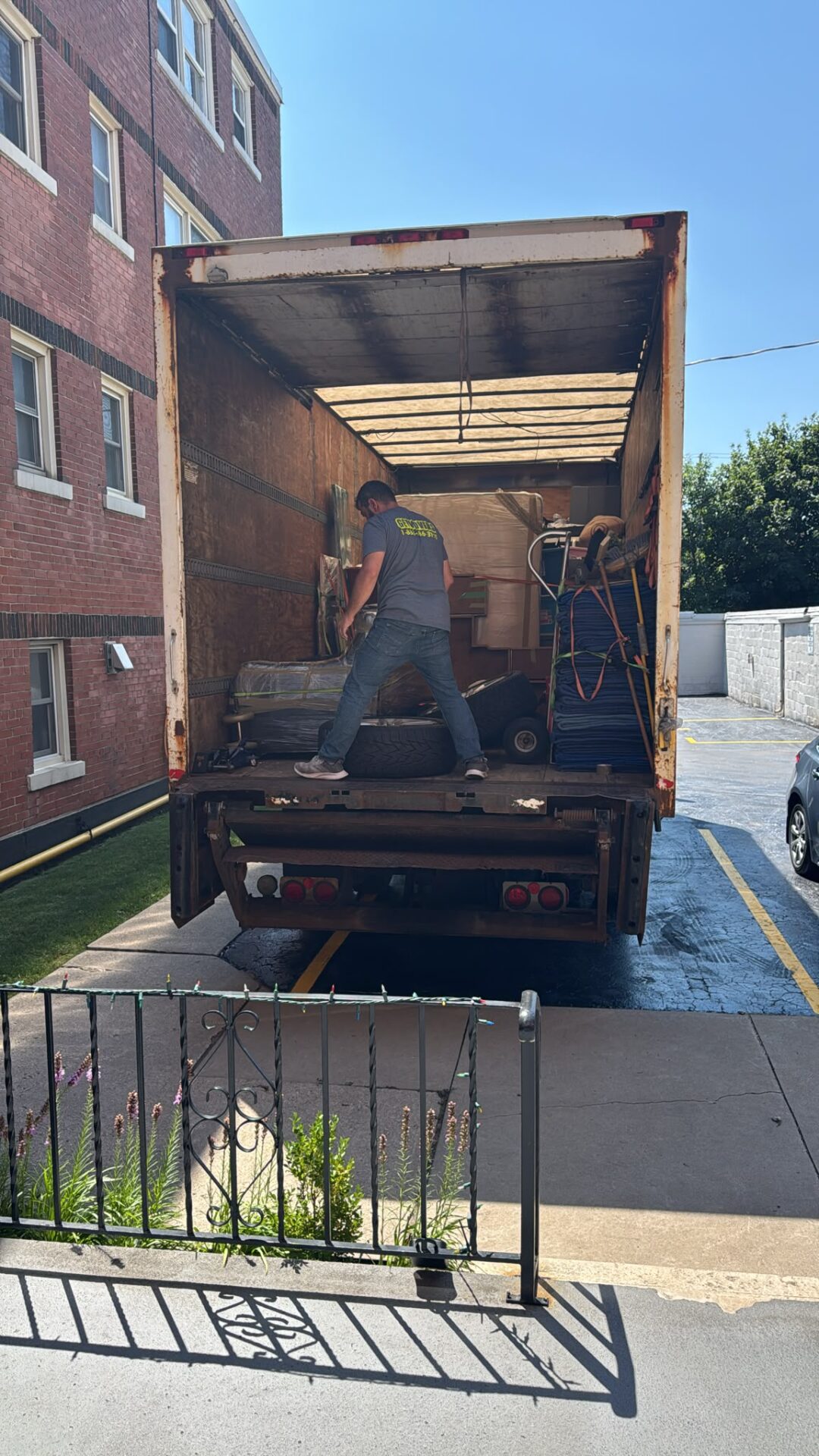 Get Movers Cambridge ON residential movers loading furniture in The Lakefront South using specialized floor runners and protective blankets